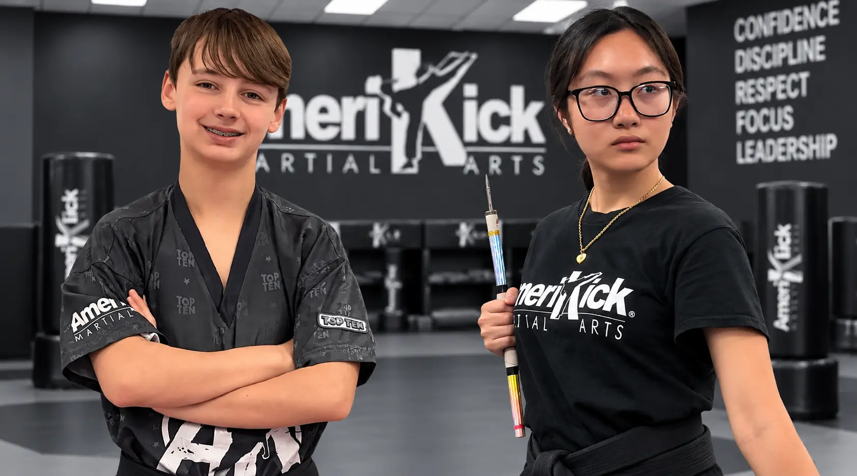 Two focused AmeriKick South Philadelphia students ready for training