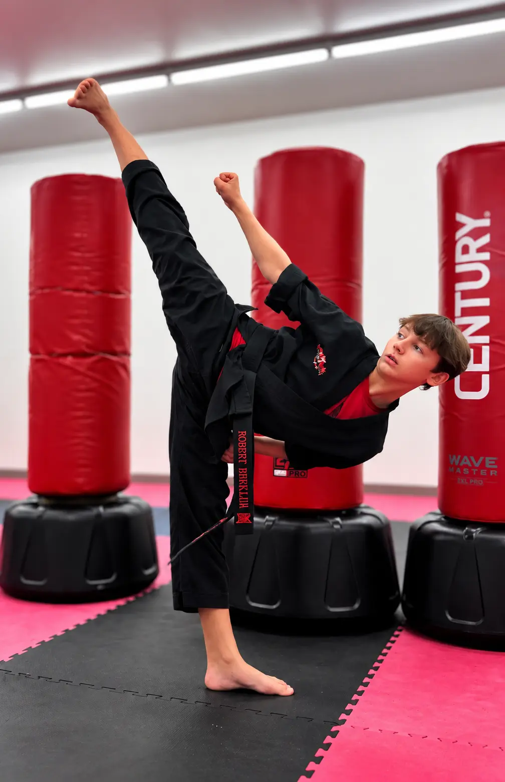 AmeriKick student practicing a high kick